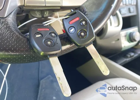 2009 Honda Pilot Touring z USA, uszkodzony, nr VIN 5FNYF38919B006474